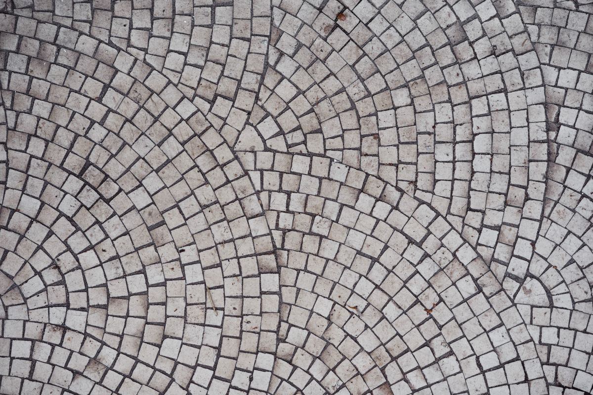 Hand-laid stone mosaic in a sweeping fan pattern